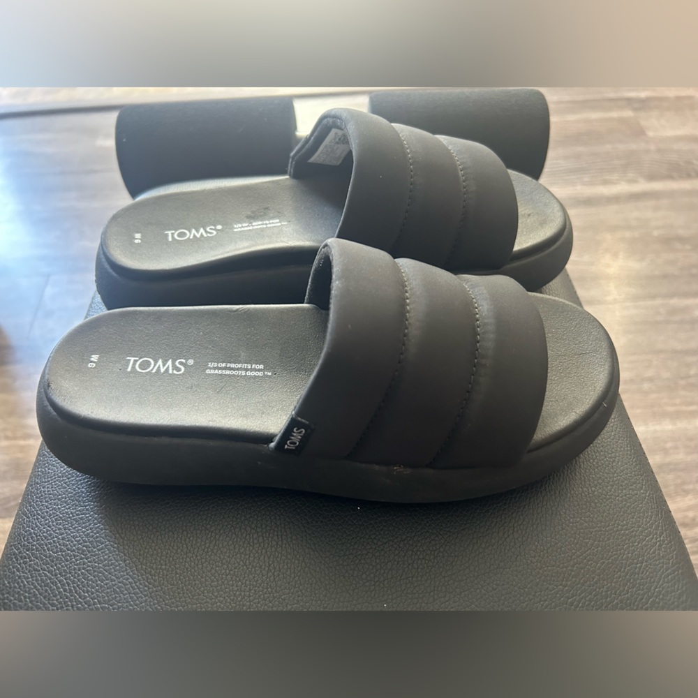 Tom’s slides. Never worn